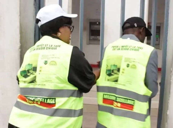 KINSHASA : LA DGRK SCELLE LES PORTES D'AFRILAND FIRST BANQUE/GOMBE